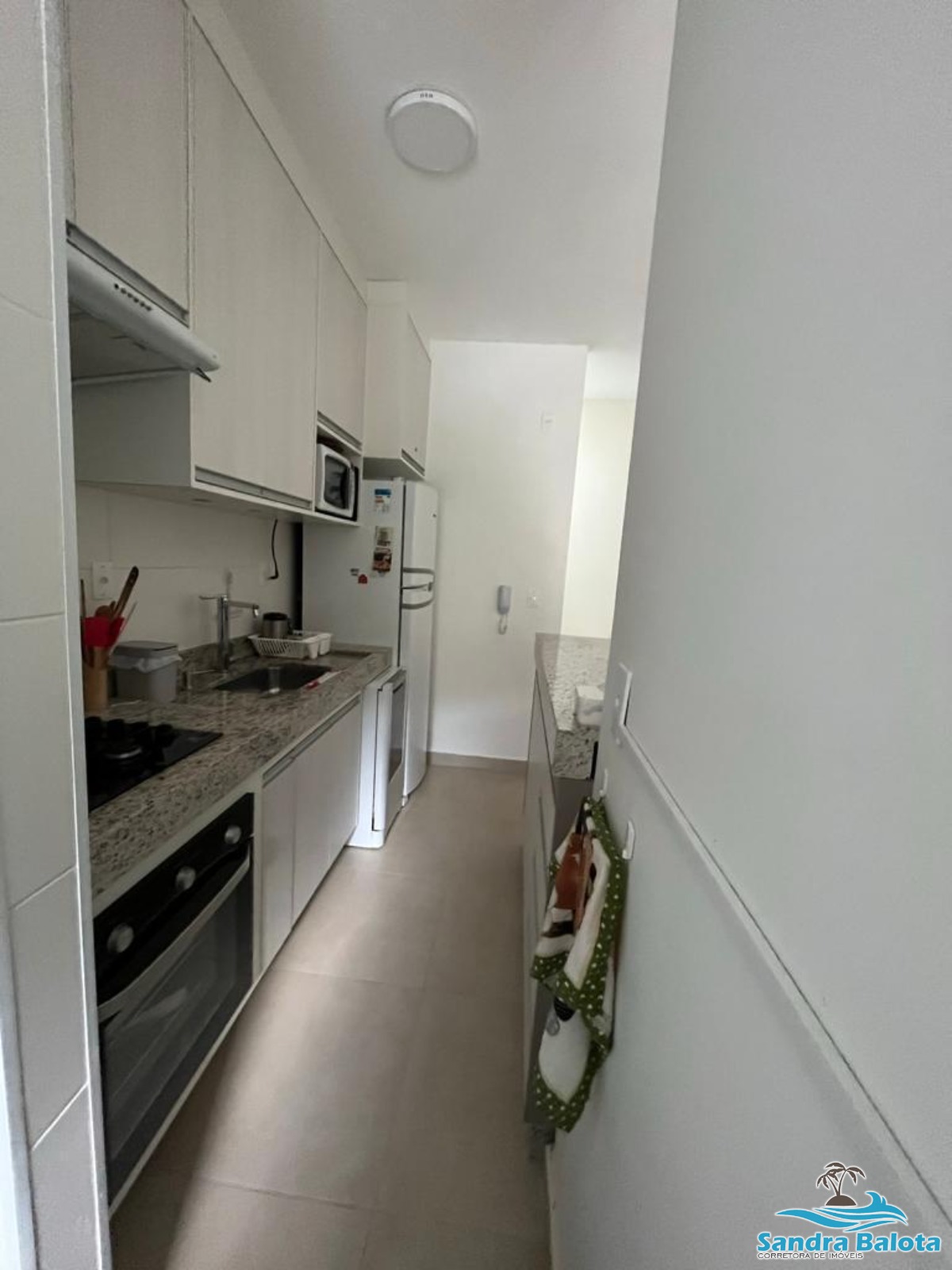Apartamento a 400 metros da Praia Grande/2 dormitórios (1 suíte)